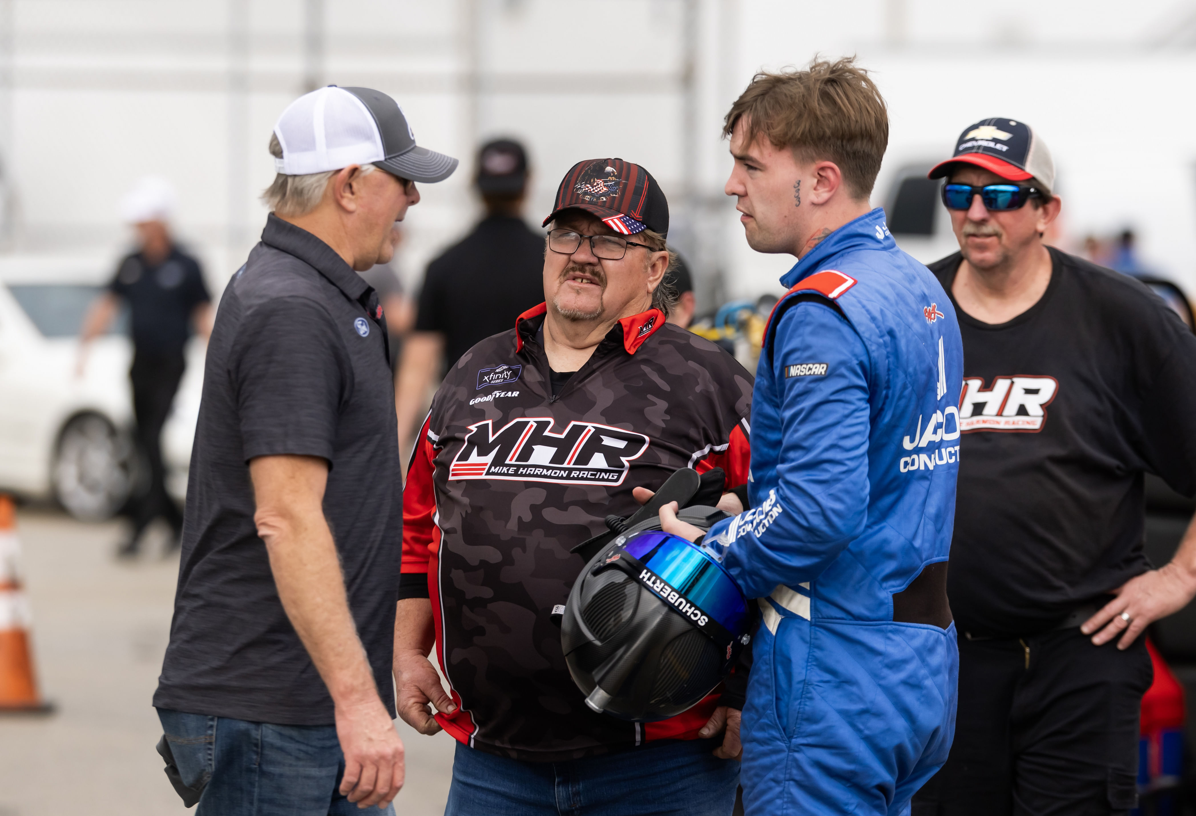 Rick Ware (L) with crew chief Mike Harmon (C) and son Carson Ware for the United Rentals 300. Source: Imagn